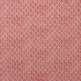Fabric sample of a red and neutral printed linen fabric with a geometric pattern