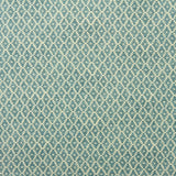 Fabric sample of a blue and neutral printed linen fabric with a geometric pattern