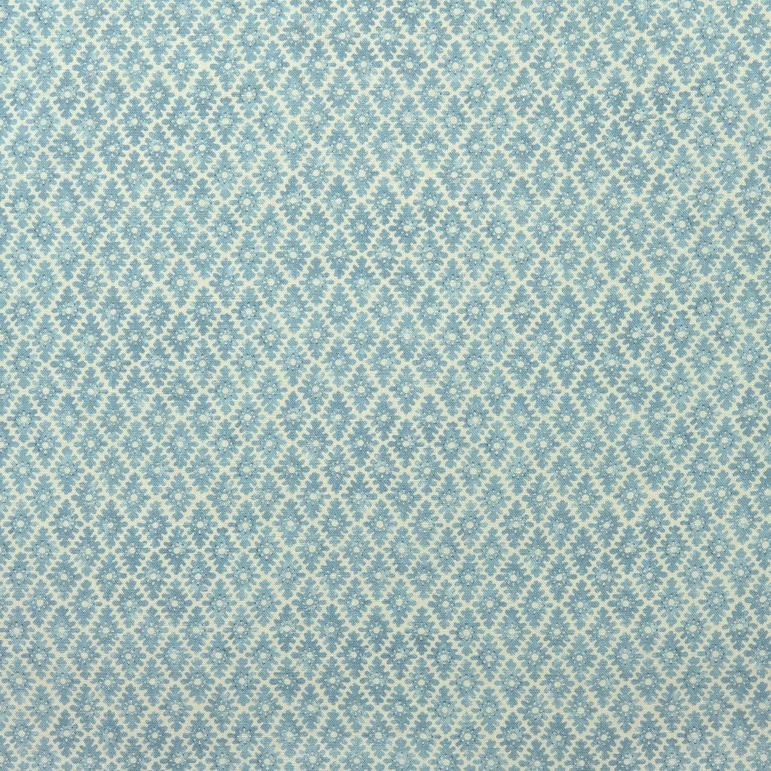 Fabric sample of blue and neutral printed linen fabric with a geometric pattern