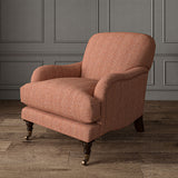 Red chair upholstered in a herringbone pure wool woven fabric.