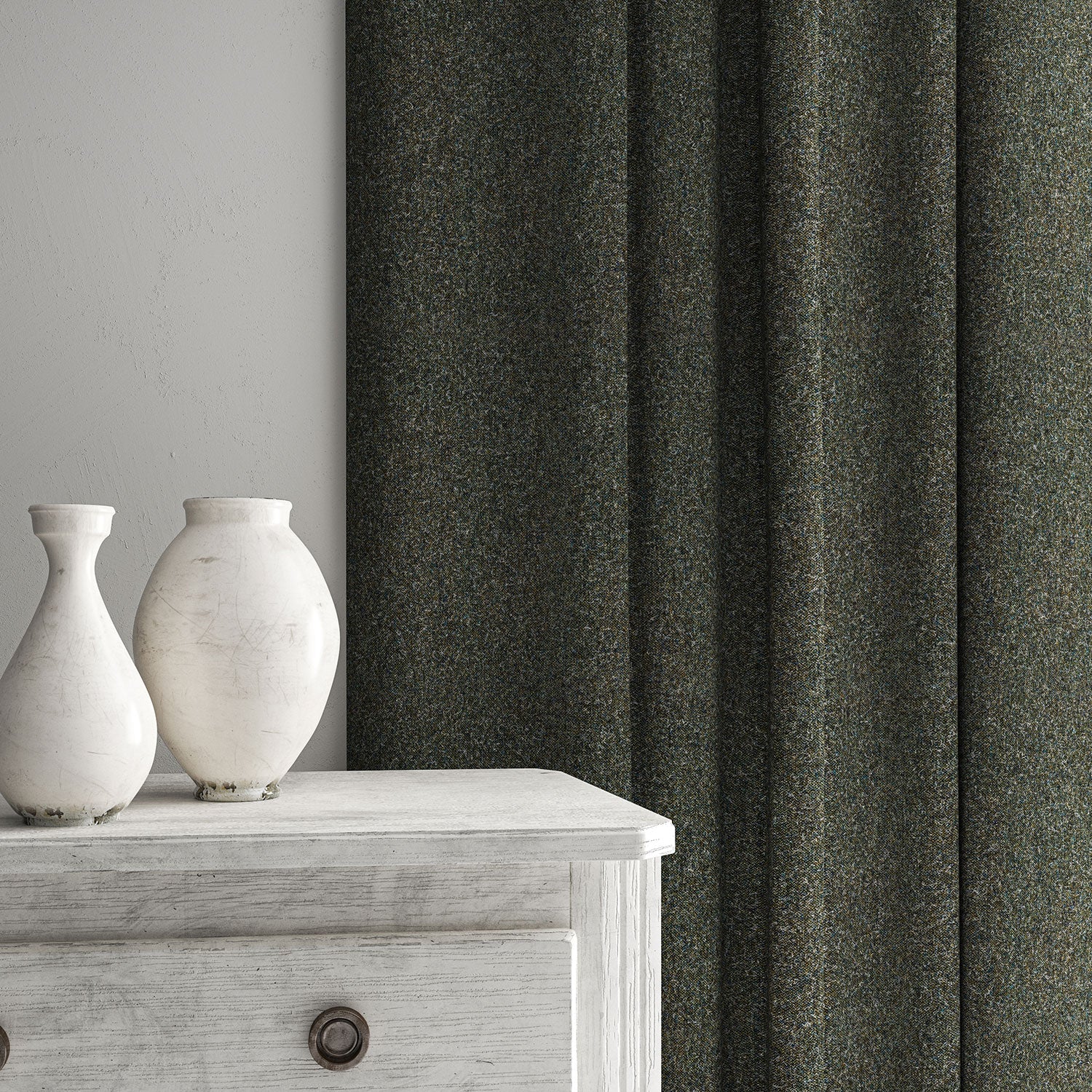 Blue curtain made from a plain pure wool woven fabric.