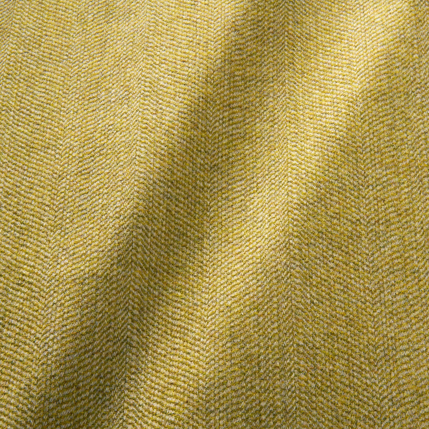 Sample of a classic herringbone woven fabric in yellow.