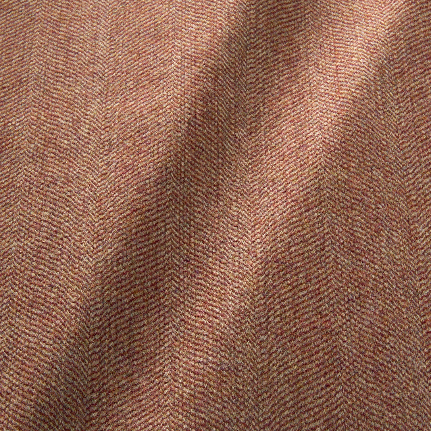 Sample of a classic herringbone woven fabric in red.