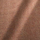 Sample of a classic herringbone woven fabric in red.