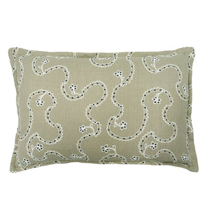 Decorative cushion with a free-flowing floral pattern on a sand coloured background.