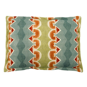Decorative cushion with geometric pattern in blue, green and ochre.