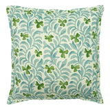 Decorative cushion with a pale blue and green floral pattern.