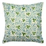 Decorative cushion with a pale blue and green floral pattern.