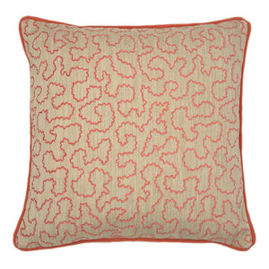 A pink and off white woven cushion featuring a wavy pattern with a velvet piping.