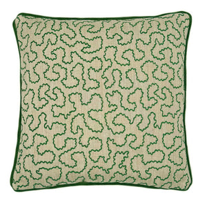 A green and off white woven cushion featuring a wavy pattern with a velvet piping.
