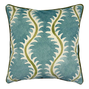 Blue velvet cushion with a stylised fern pattern.
