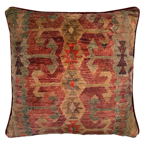 Linwood cushion in Samimi, Earth. Overhead view showing the full front design, a softly textured velvet that evokes the look of a time-worn kilim.