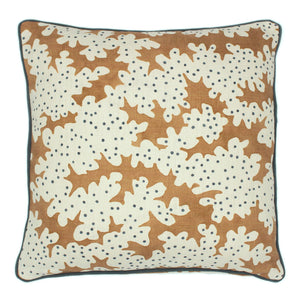 This brown and blue stylized coral pattern’s free-flowing and tonal movement lends this cushion a natural appearance.