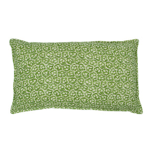 A green and cream linen cushion with a block print pattern.