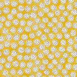 A linen printed with a subtle all-over repeat in yellow, cream and black