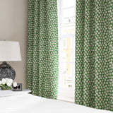 Linen curtain with a subtle all-over repeat in green, cream and black