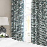 Linen curtain with a subtle all-over repeat in blue, cream and black