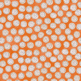 A linen printed with a subtle all-over repeat in orange, cream and black