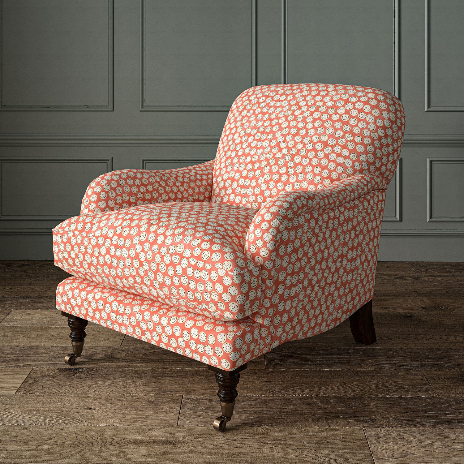 Armchair covered in a linen printed with a subtle all-over repeat in pink, cream and black