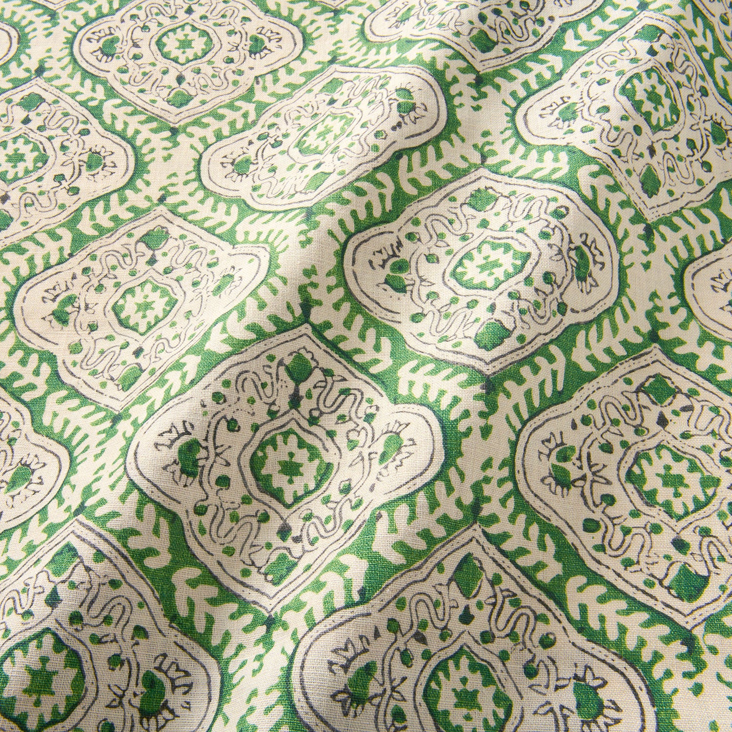 Linen print with a handcrafted feel in green