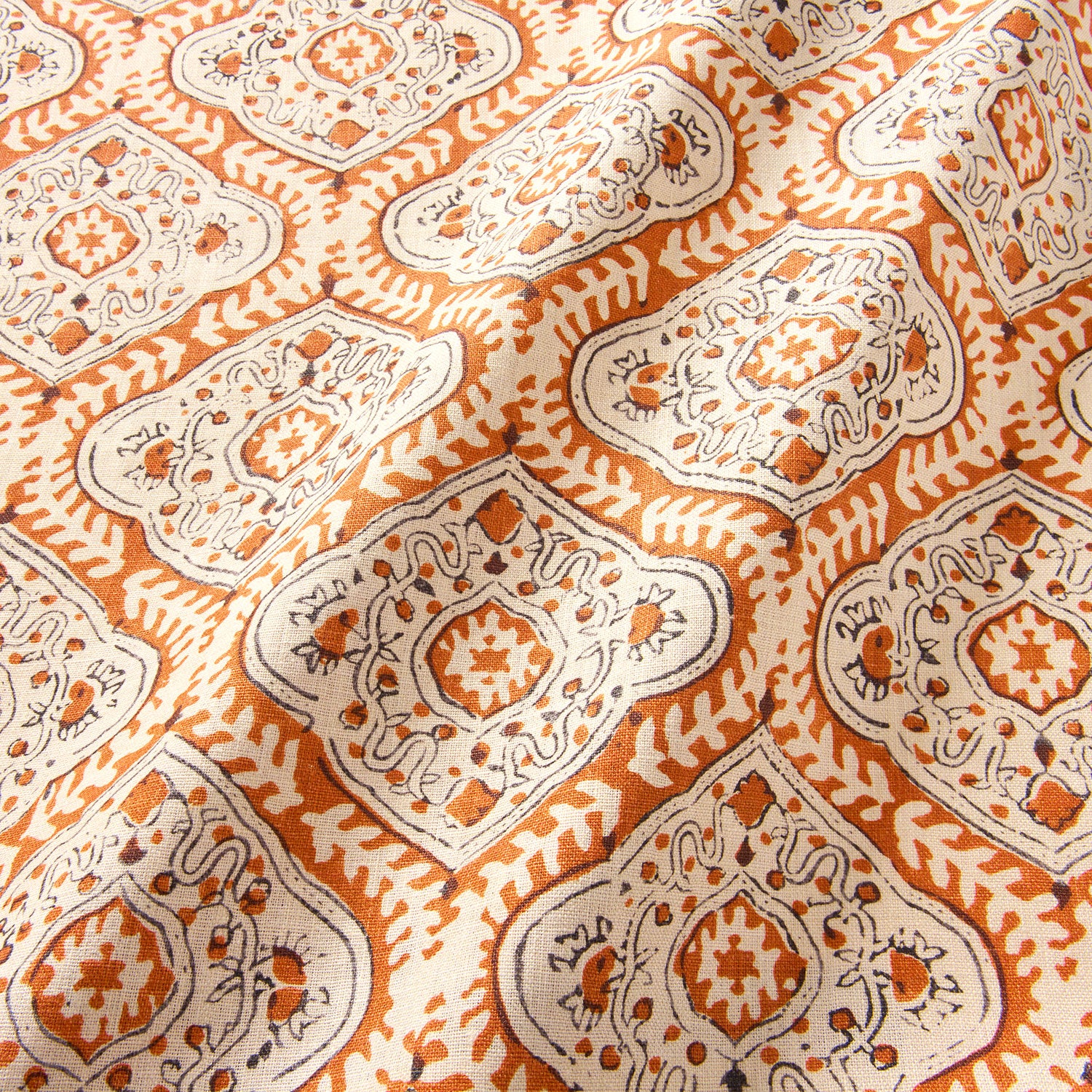 Linen print with a handcrafted feel in orange