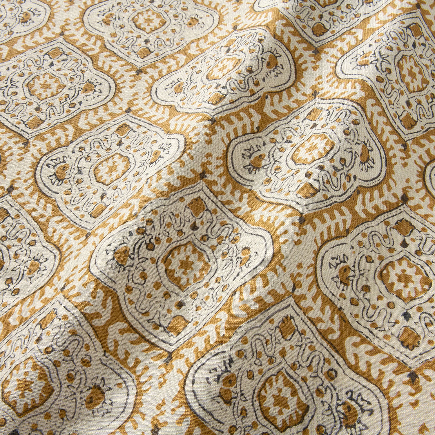 Linen print with a handcrafted feel in ochre
