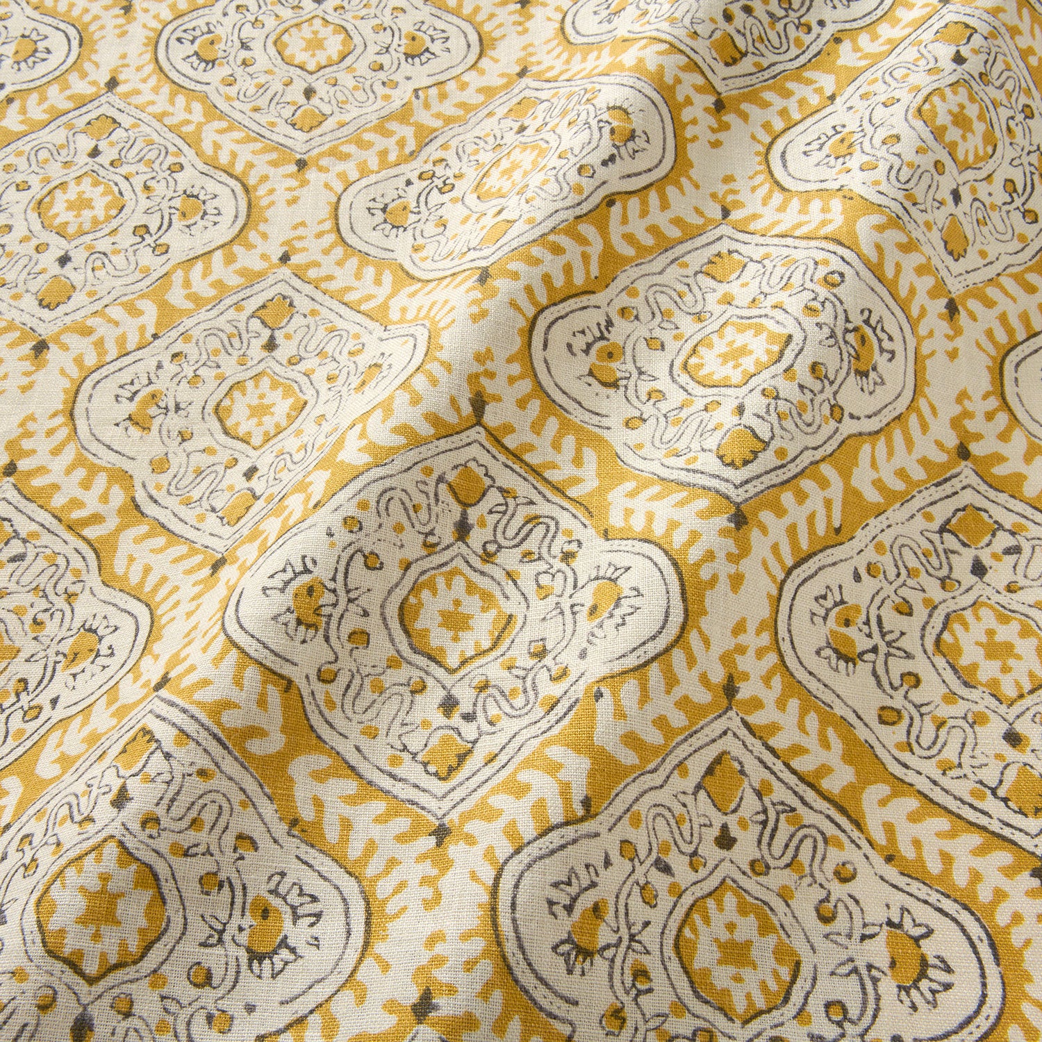 Linen print with a handcrafted feel in yellow