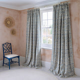 Linen curtain with a handcrafted-style print in blue