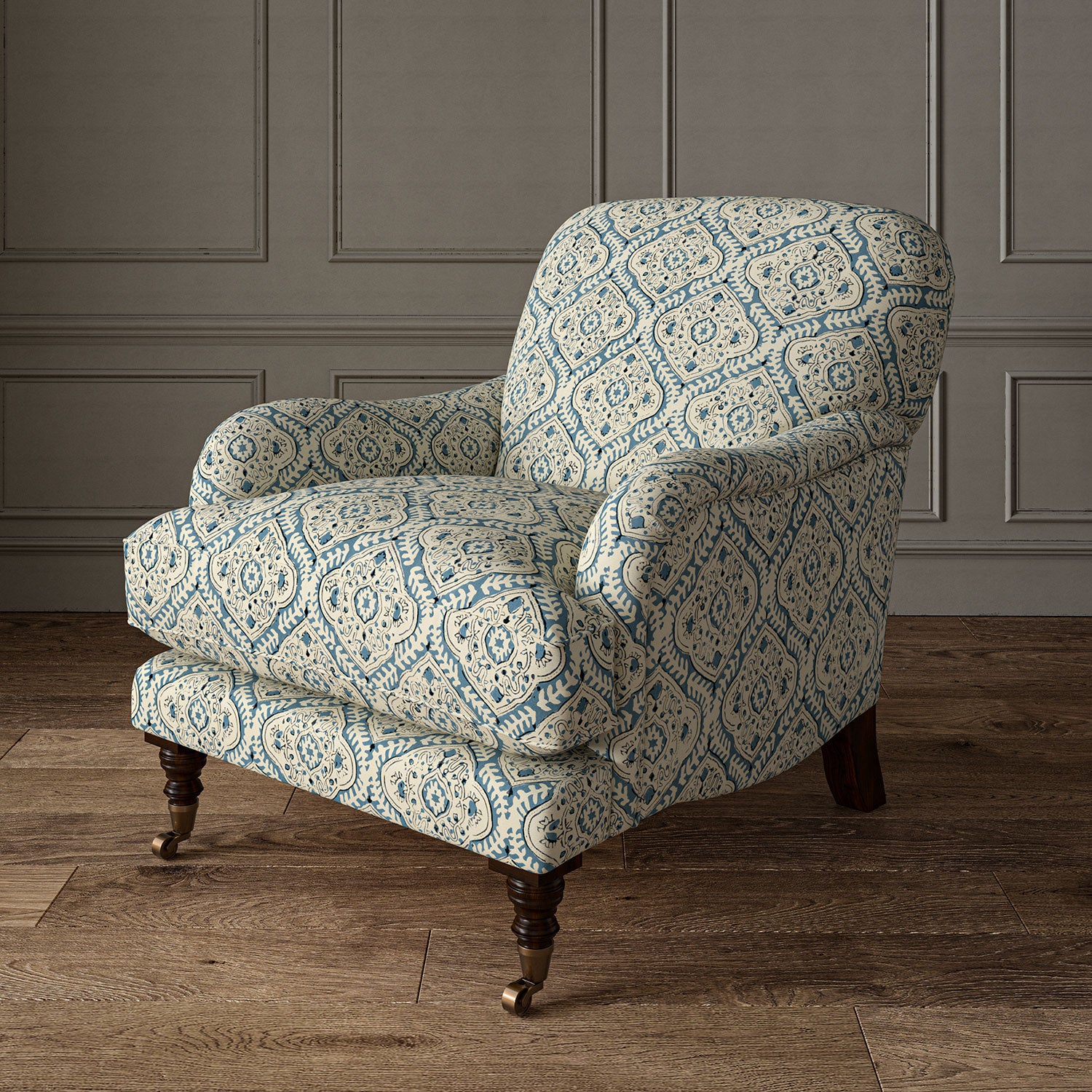Armchair covered in a linen print with a handcrafted feel in blue