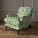 Armchair covered in a linen print with a handcrafted feel in green