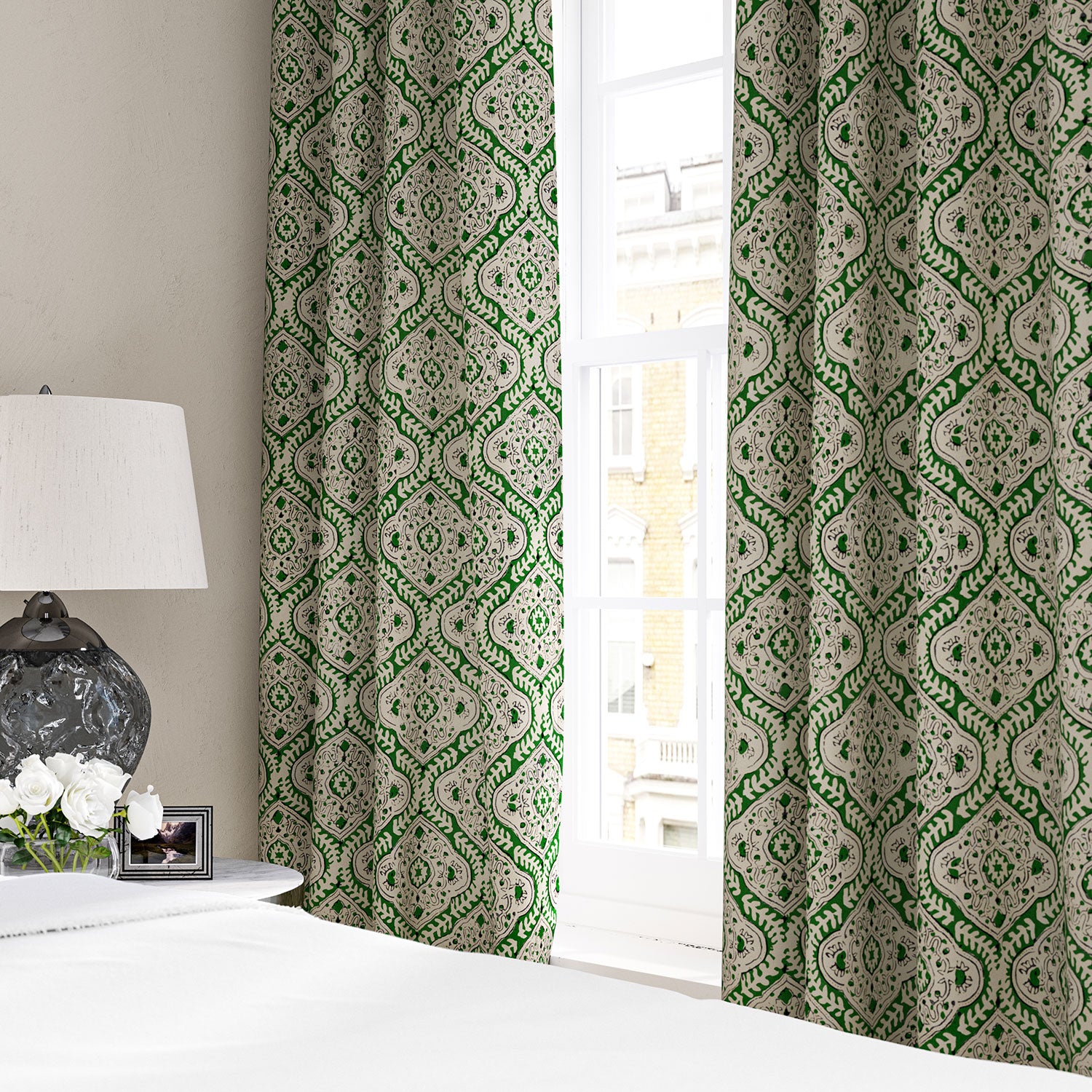 Linen curtain with a handcrafted-style print in green