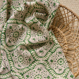 Linen print with a handcrafted feel in green