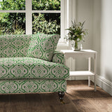 Sofa covered in a linen print with a handcrafted feel in green