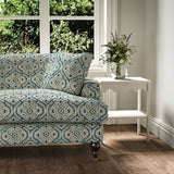 Sofa covered in a linen print with a handcrafted feel in blue