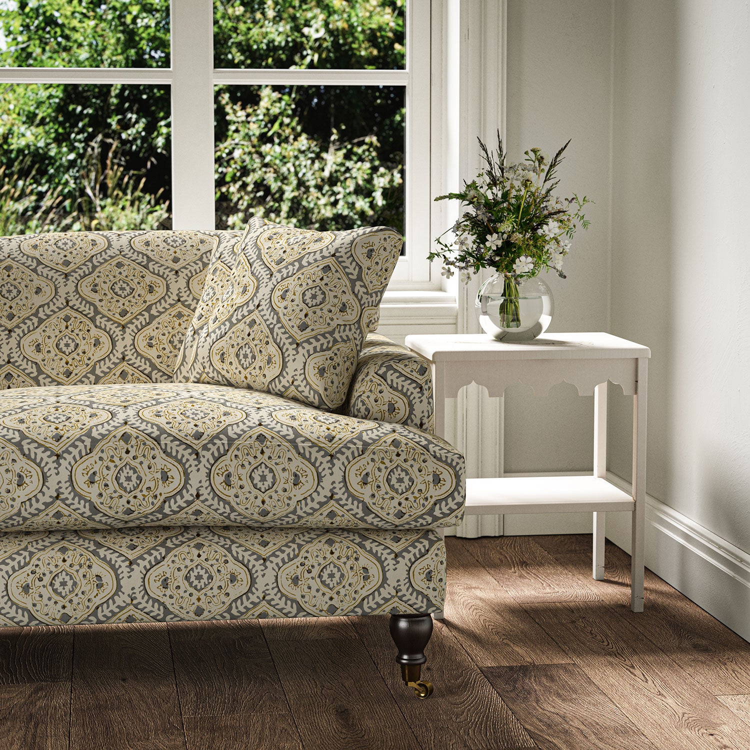 Sofa covered in a linen print with a handcrafted feel in grey