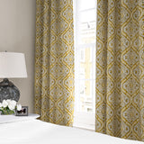 Linen curtain with a handcrafted-style print in yellow