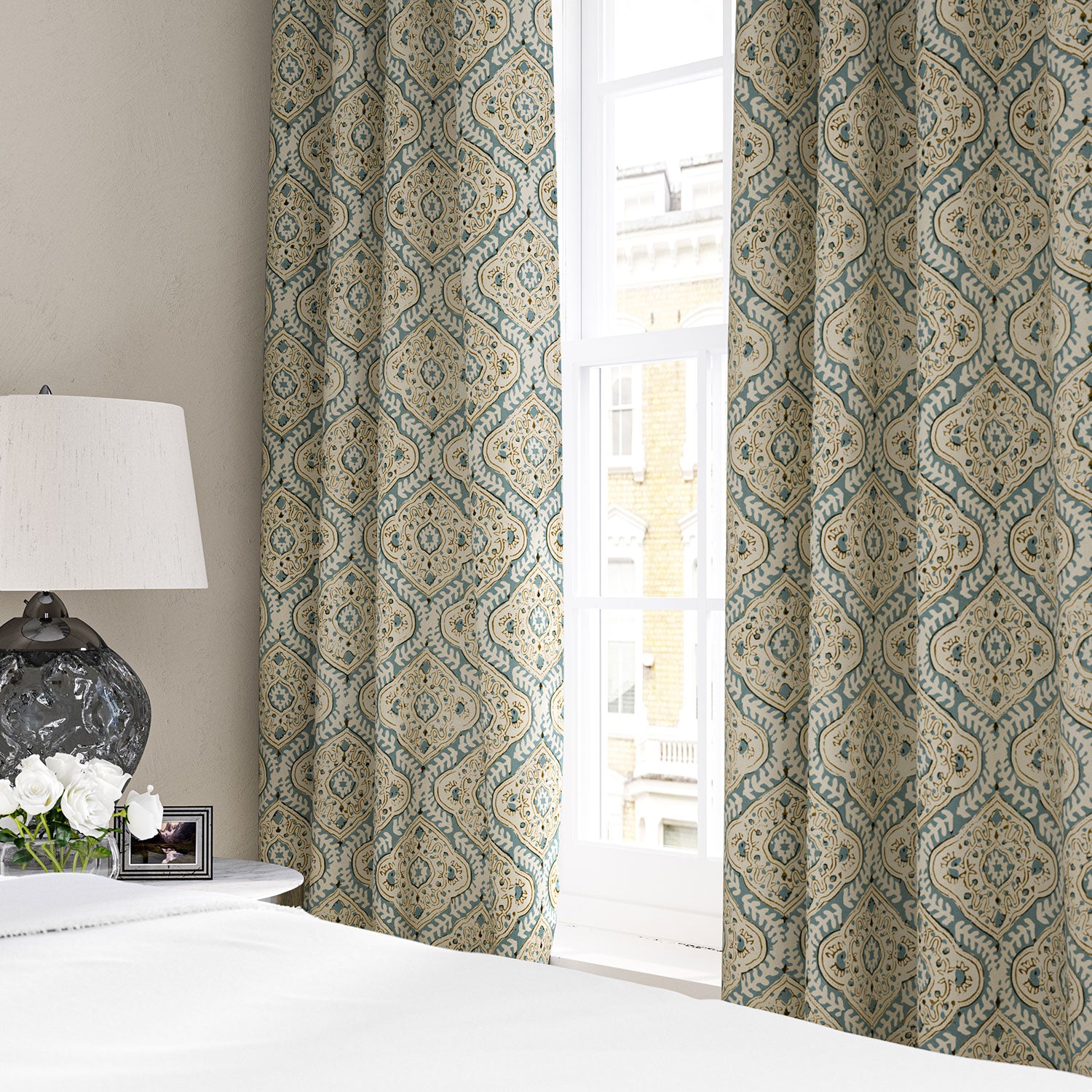 Linen curtain with a handcrafted-style print in blue