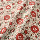 A stylised floral printed on linen fabric in red, black and cream