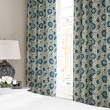 Stylised floral linen curtain in blue, black and cream
