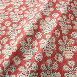A jolly printed linen fabric in red, black and cream
