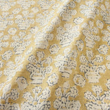 A jolly printed linen fabric yellow, black and cream