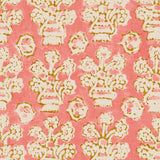 A jolly printed linen fabric in pink, orange and cream