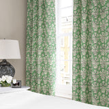 Linen curtain with a jolly and characterful pattern in green, black and cream