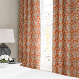Linen curtain with a jolly and characterful pattern in orange, blue and cream