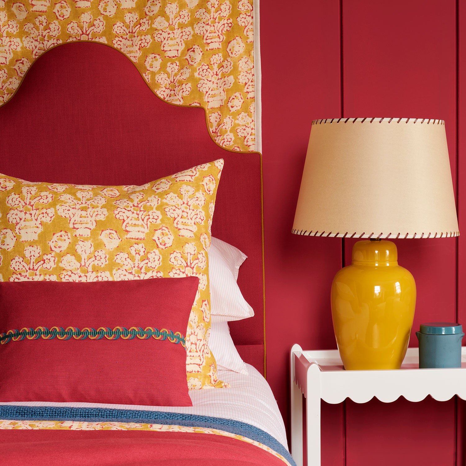 Cushion in jolly printed linen fabric in yellow, red and cream