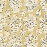 A jolly printed linen fabric in yellow, black and cream