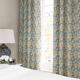Linen curtain with a jolly and characterful pattern in blue, yellow and cream