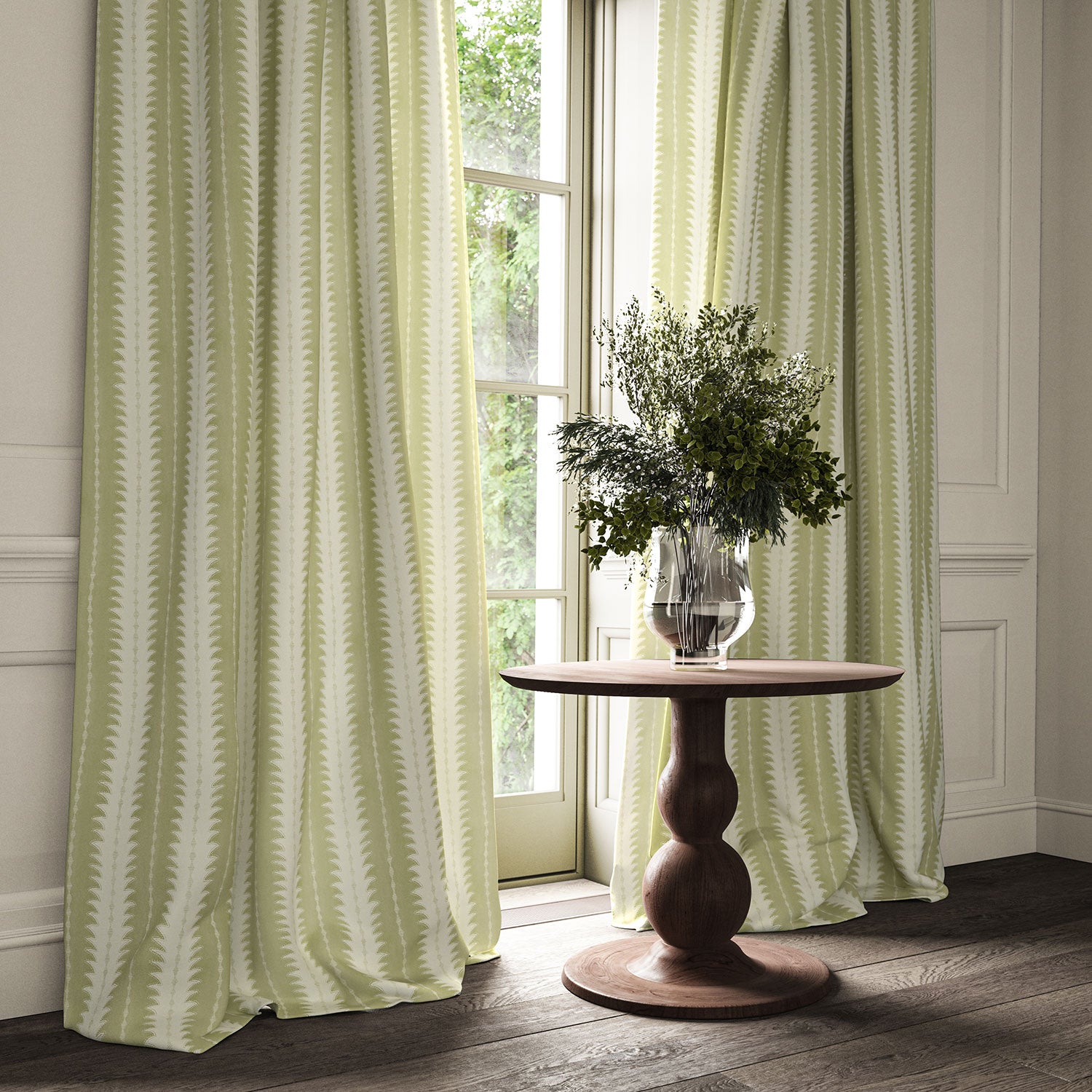 Curtains made from a printed linen fabric in green and off white, featuring a striped fern design.