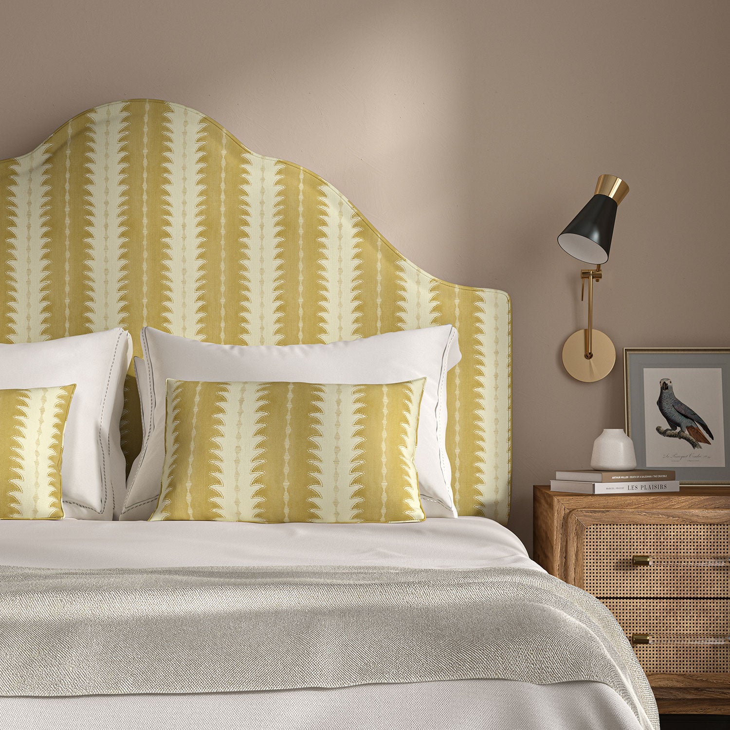 Headboard upholstered in a printed linen fabric in yellow and off white, featuring a striped fern design.