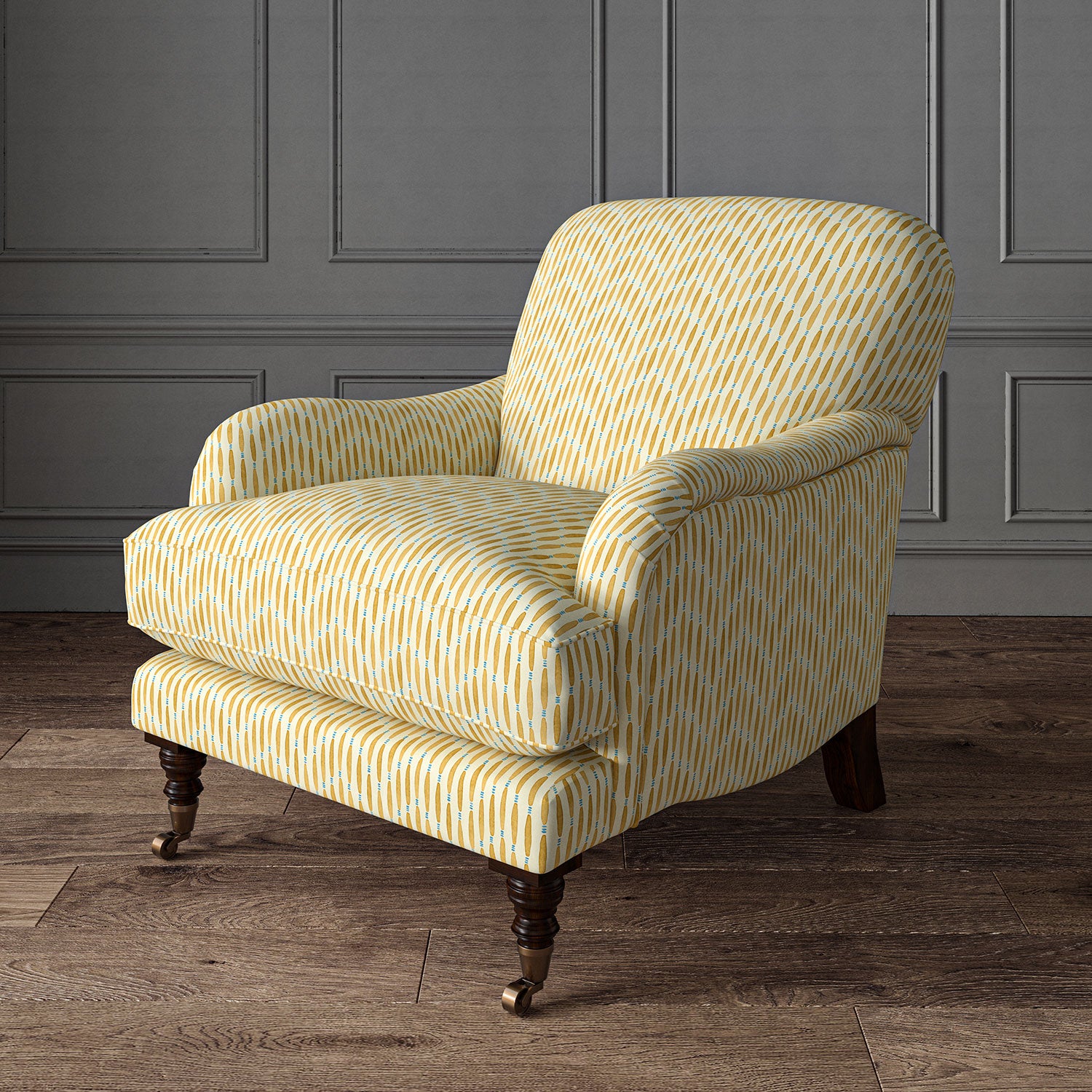 Armchair upholstered in a printed linen fabric in yellow, blue and off white featuring a Japanese print.